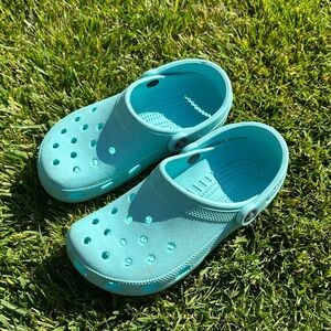 teal crocs